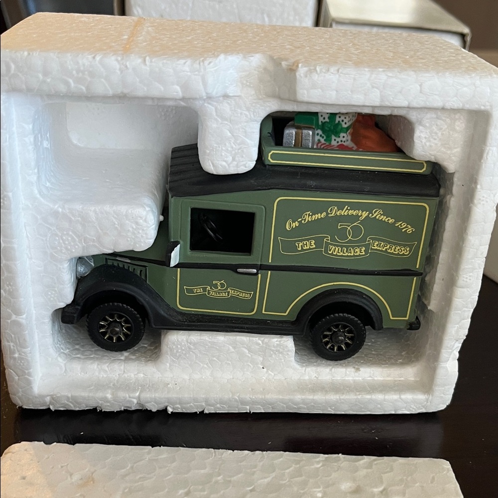 Department 56 Green and Black Delivery Truck with gifts on top